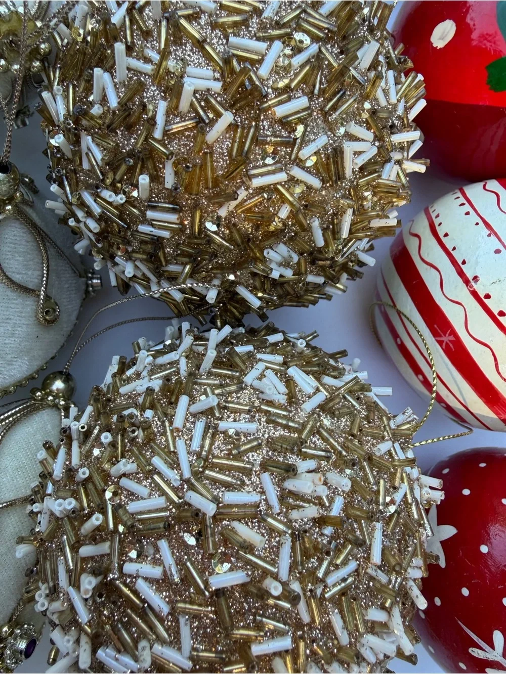 Lot of assorted Holiday Christmas Ornaments in Red, Gold, and White